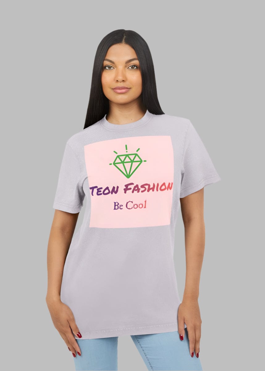 A person wearing a gray crew neck t-shirt with text and a graphic on it.