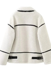 White fleece jacket with black accents on a white background