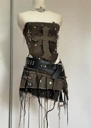 A gothic inspired two-piece denim outfit set displayed on a mannequin, consisting of a washed zipper coat and a pleated mini skirt, both in a brown-washed denim style with black embellishments and a black belt.
