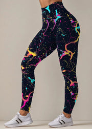 Leggings with colorful abstract pattern on a neutral background