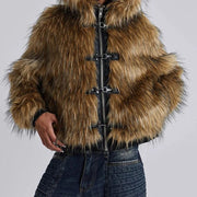 Brown fur jacket with a zipper on a plain background