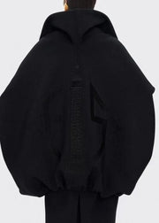 Black hoodie with a textured pattern on the back against a white background