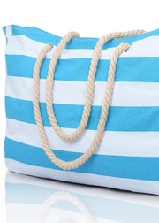 Blue and white striped tote bag with rope handles on a white background