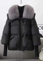 Black puffer jacket with gray fur collar on a white background