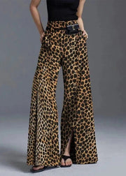 Leopard print wide-leg pants worn by a person on a gray background
