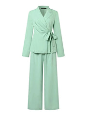 Mint green suit with a bow detail on a white background, brand 'ZANZEA' visible.