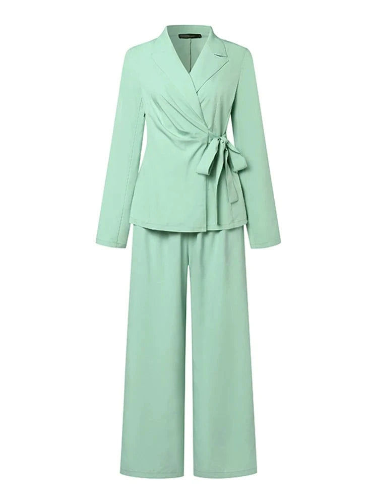 Mint green suit with a bow detail on a white background, brand 'ZANZEA' visible.