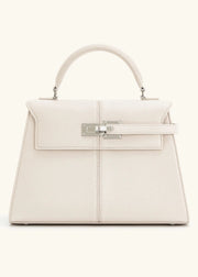 White handbag with silver hardware on a white background