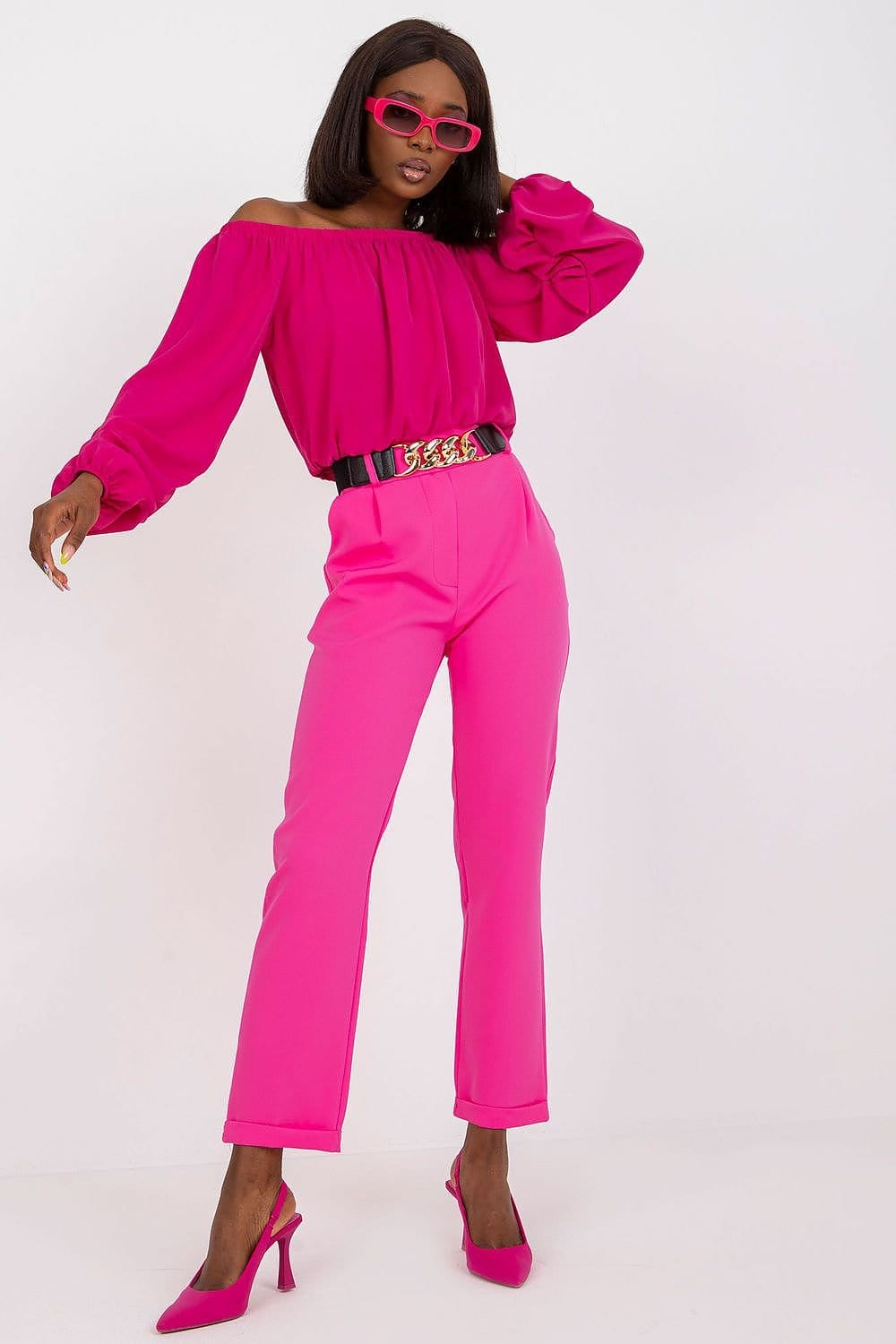 Teon Clothing EU Pants with a high waist and a decorative belt