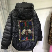 Teonclothingshop A warm jacket with a hood and a zircon