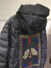 Teonclothingshop A warm jacket with a hood and a zircon