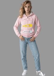 Person wearing a pink hoodie with unique designs and light blue jeans on a gray background, with 'arvin' branding.