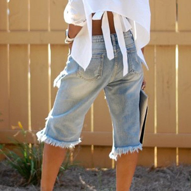 Teonclothingshop Baggy denim shorts with ripped holes