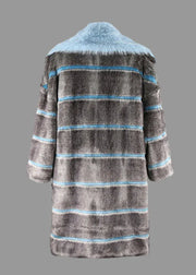 Striped fur coat with blue accents on a light gray background, featuring the Nerazzurri brand.