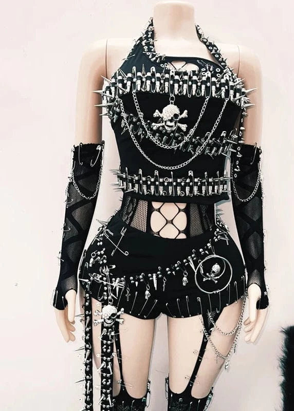 Black and white gothic outfit with chains and skull designs on a mannequin against a light background.