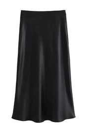 Black satin skirt on a white background