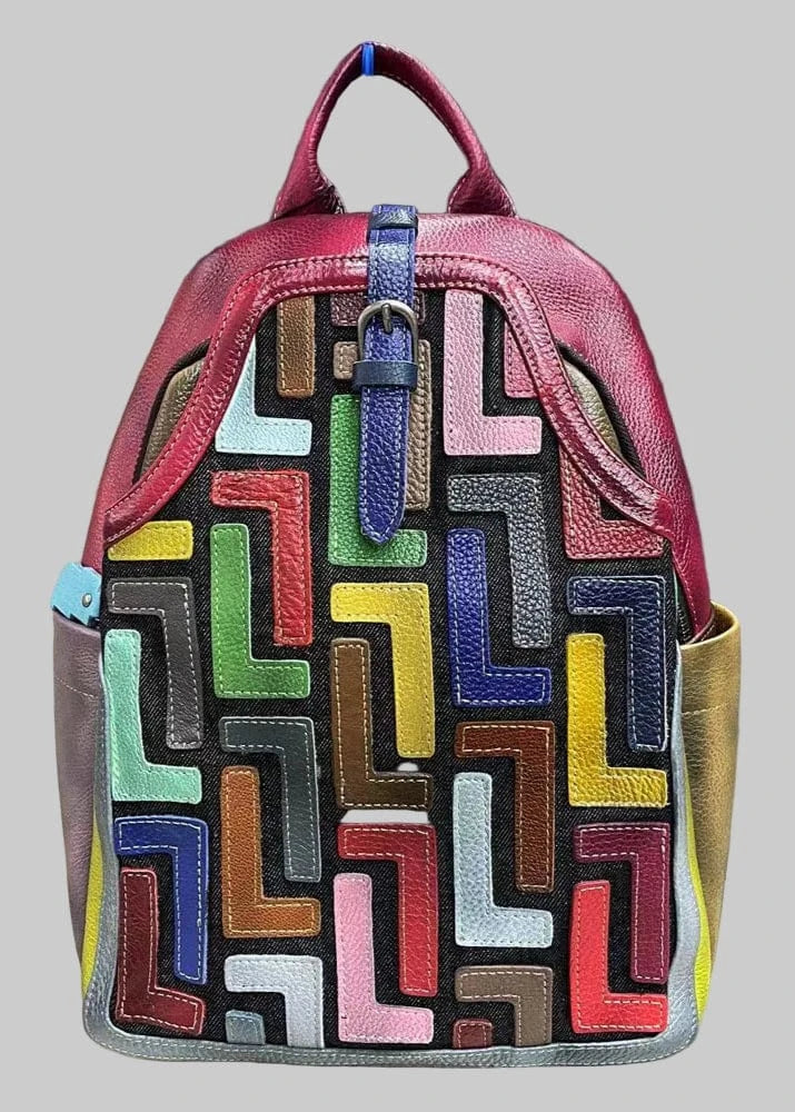 Backpack with colorful geometric pattern on a textured surface