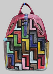 Backpack with colorful geometric pattern on a textured surface
