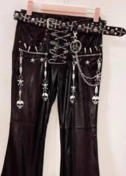 Black leather pants with silver chain and skull embellishments on a white background