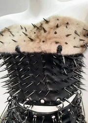 Black spiked leather corset with fur top on a mannequin against a white background
