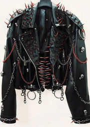 Black leather jacket with spikes, chains, and studs on a white background