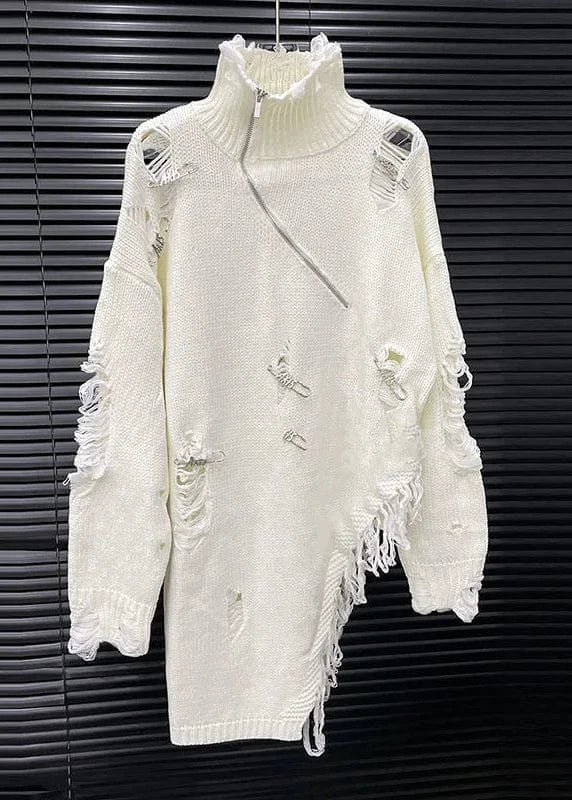 White distressed sweater on a black background