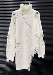 White distressed sweater on a black background