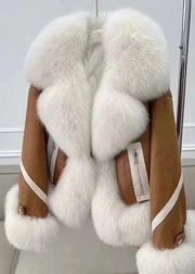 Brown leather jacket with white fur trim on a white background