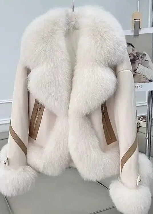 White fur coat with brown accents on a chair