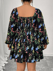 Black floral dress worn by a person with a white background