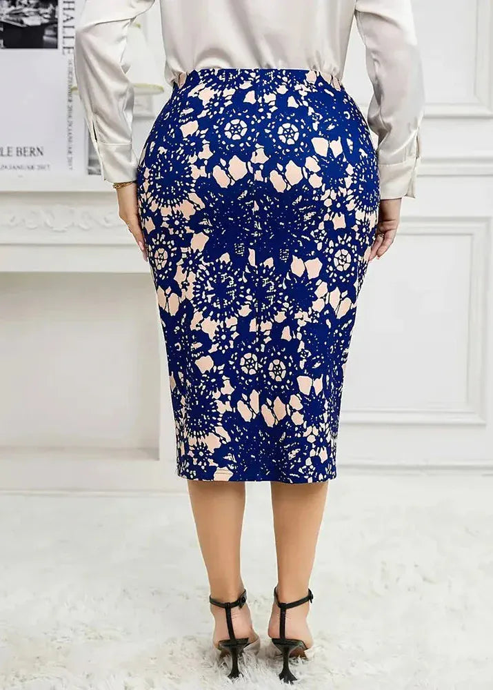 Person wearing a blue floral pencil skirt with a white background