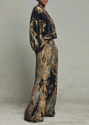 Person wearing a patterned outfit with a textured background