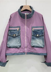 Purple jacket with denim accents on a white background