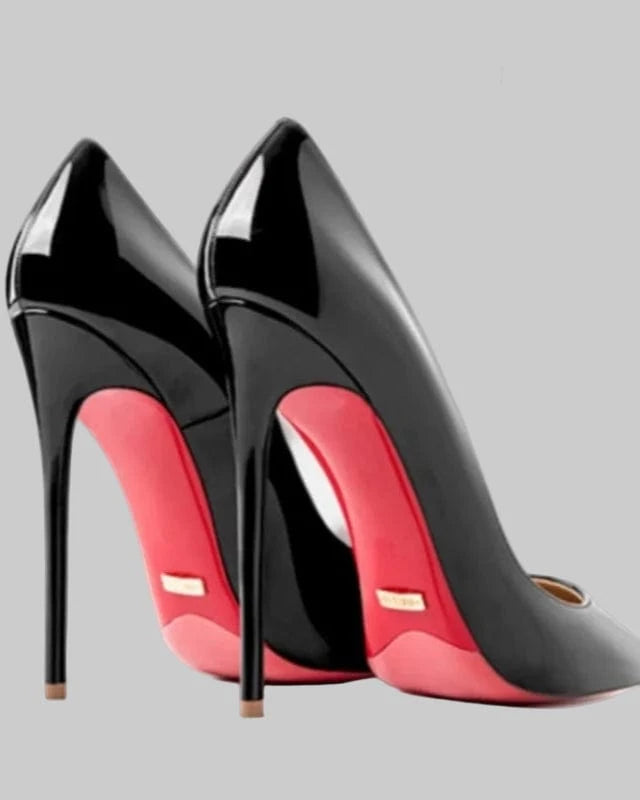 Black high-heeled shoes with red soles on a white background, featuring the brand 'Hltino'.