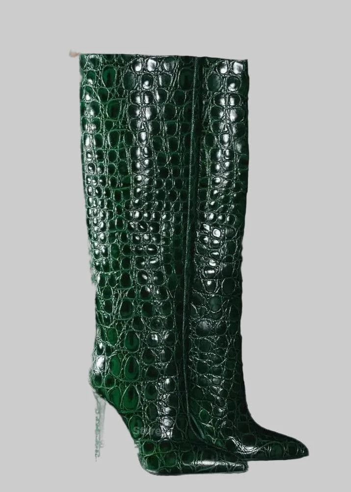 Green crocodile-patterned boots on a black background with 'Hemegot' branding.