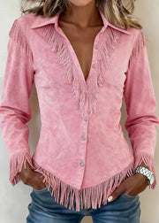 Pink suede fringe jacket worn by a person against a neutral background