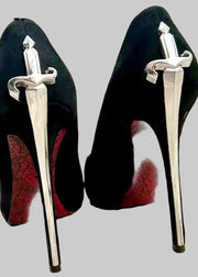 Black high-heeled shoes with silver sword designs on a light background, featuring the brand 'ABENGYA'.