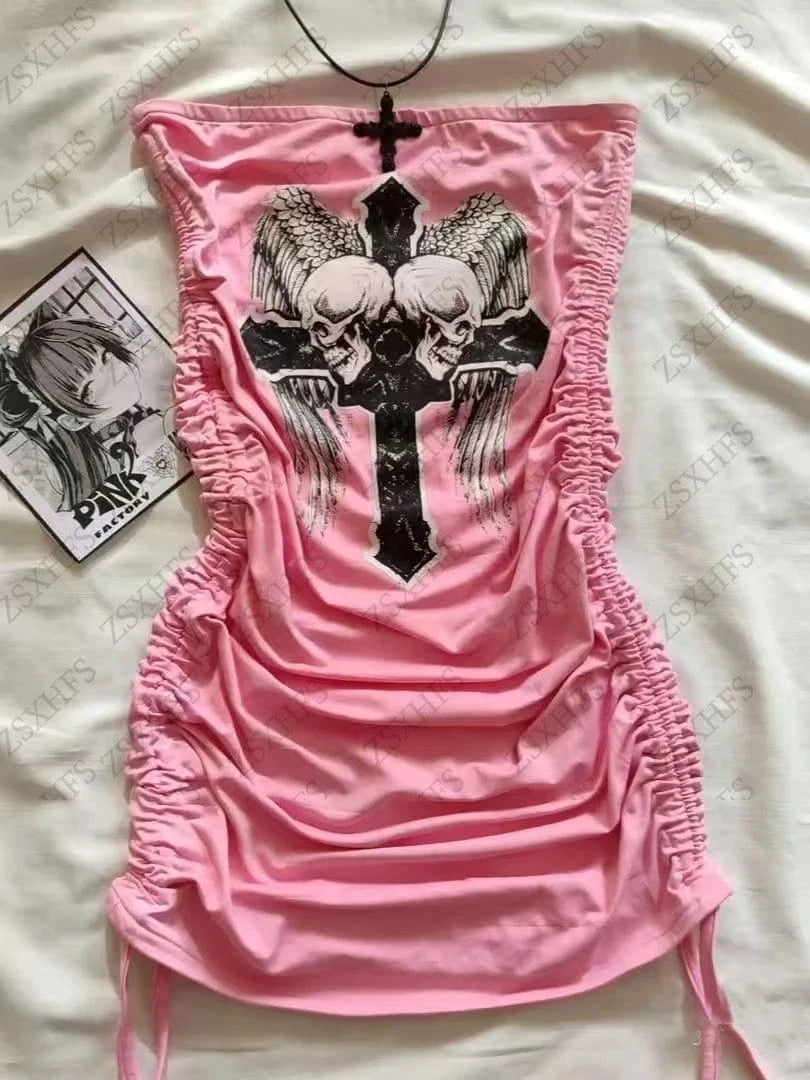 Pink tank top with skull and cross design on a white surface