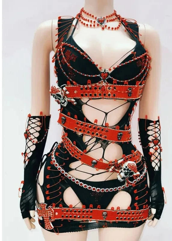 Black and red dress with intricate designs on a mannequin against a white background