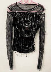 Black long-sleeve top with skull designs and mesh sleeves on a hanger against a white background
