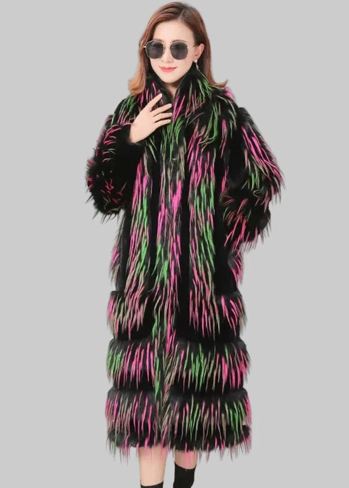 Woman wearing a long, patterned coat with a brand logo in the corner.