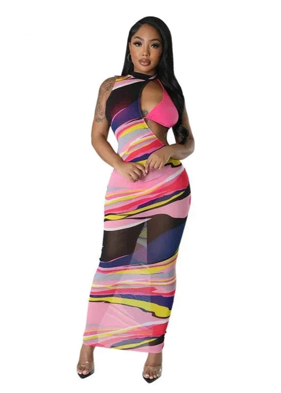 Woman wearing a colorful dress with 'passion goddess' branding.