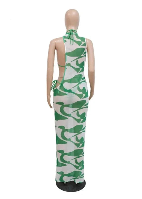 Mannequin wearing a green and white patterned dress with 'passion goddess' branding.