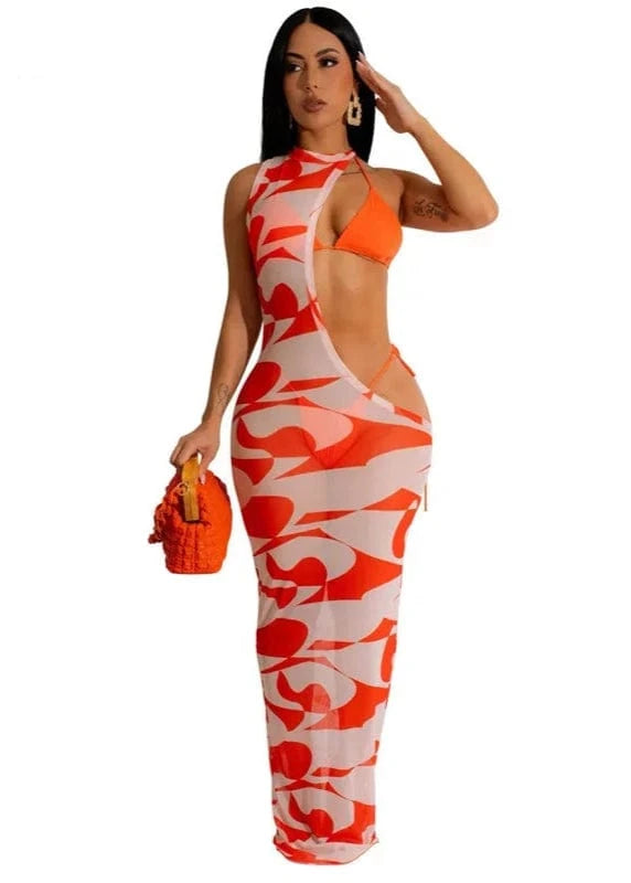 Woman wearing a red and white patterned outfit with an orange handbag on a white background.