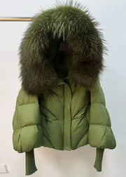 Green puffer jacket with fur hood on a white background