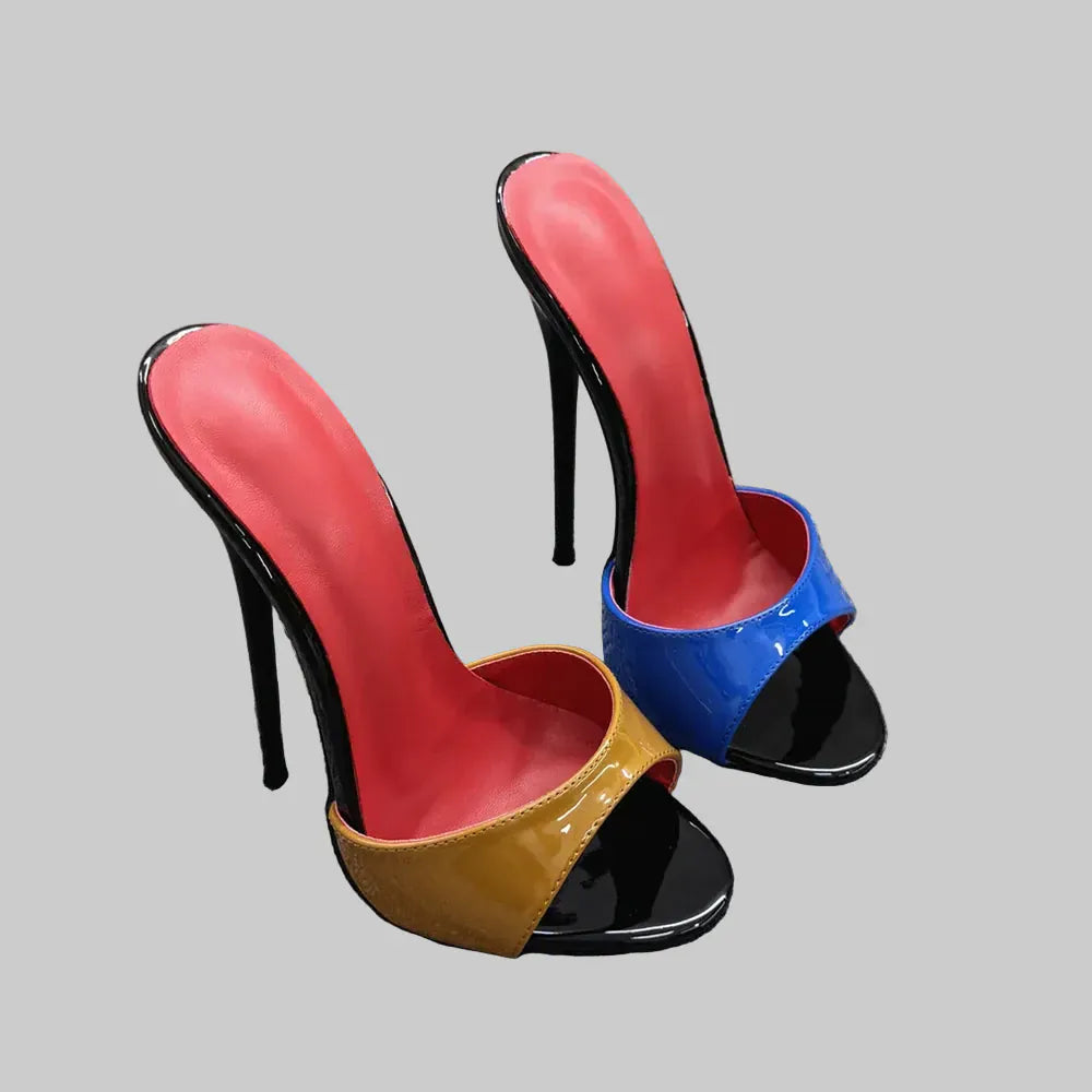Colorful high-heeled shoes on a textured surface with a neutral background