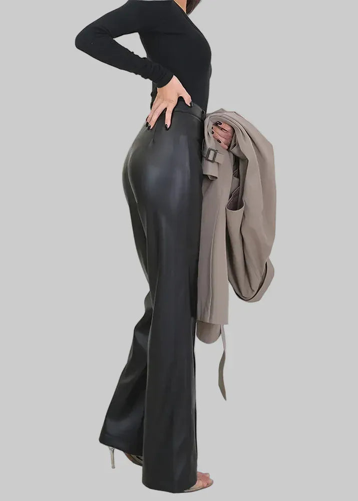 Person wearing black leather pants with a gray jacket on a white background, featuring the brand 'Lautaro'.