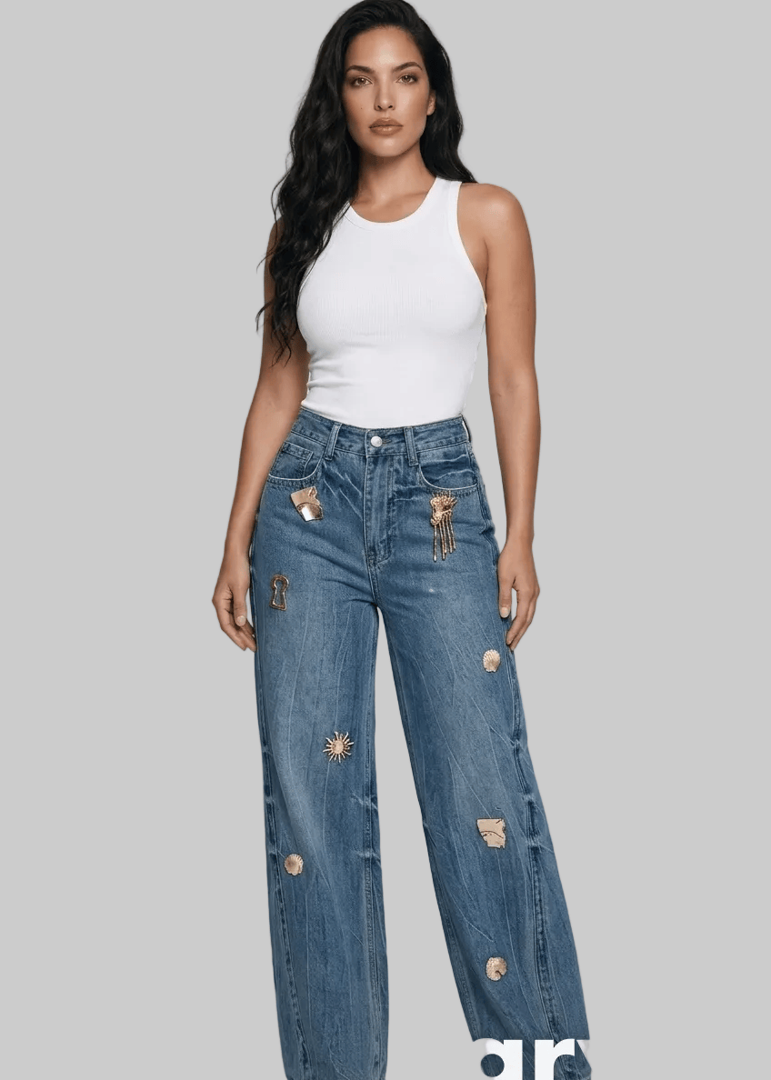 Woman wearing distressed blue jeans and a white top on a gray background with 'arvin' branding.