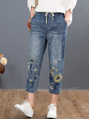 Teonclothingshop Women's casual denim pants with a floral pattern