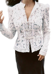 White lace blazer worn by a person on a white background